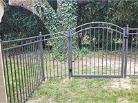 <b>54'' high Alumi-Guard Fairmont Style aluminum fence in Florida Bronze color with ball caps on posts and single arched walk gate</b>